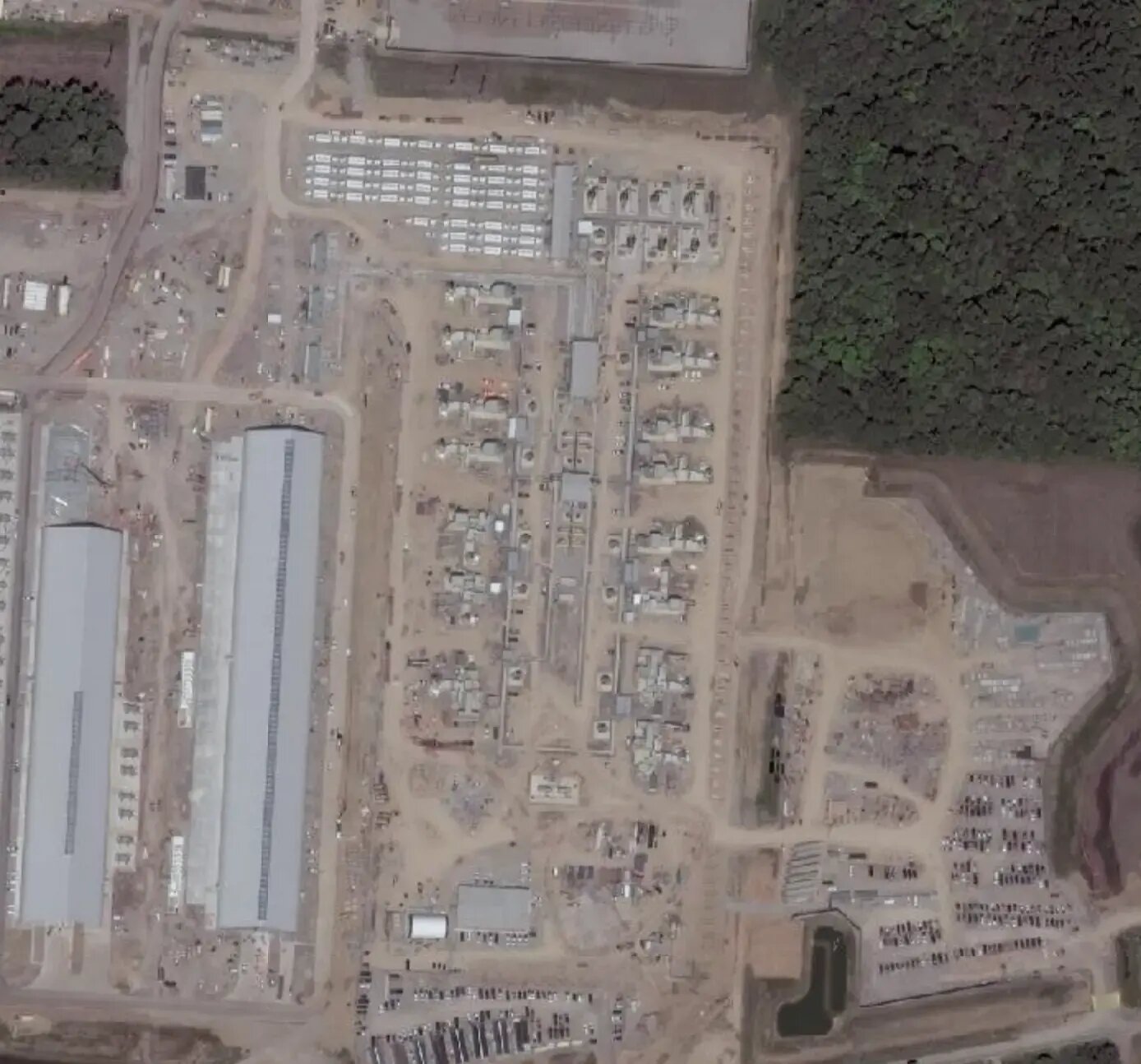 Aerial view of an on-site power and data-center campus under construction, serving one major customer